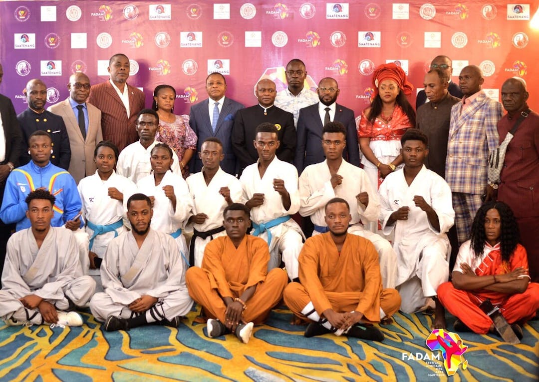 Athletes and organising committee posing for a photo